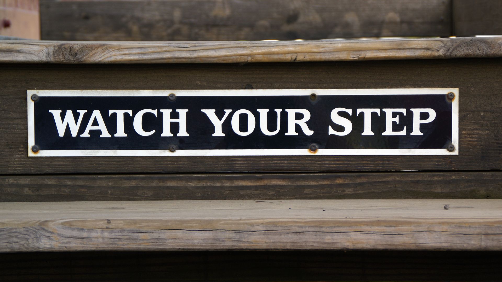 watch your step sign